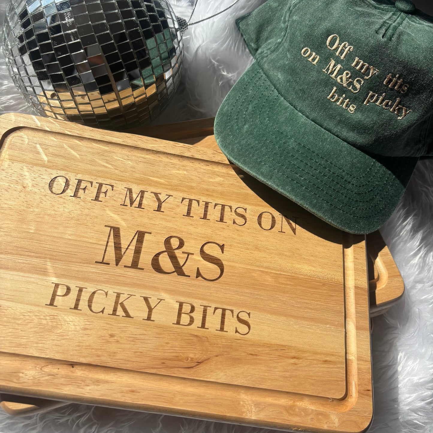 Off my tits on M&S picky bits engraved chopping / cheese board. Viral slogan