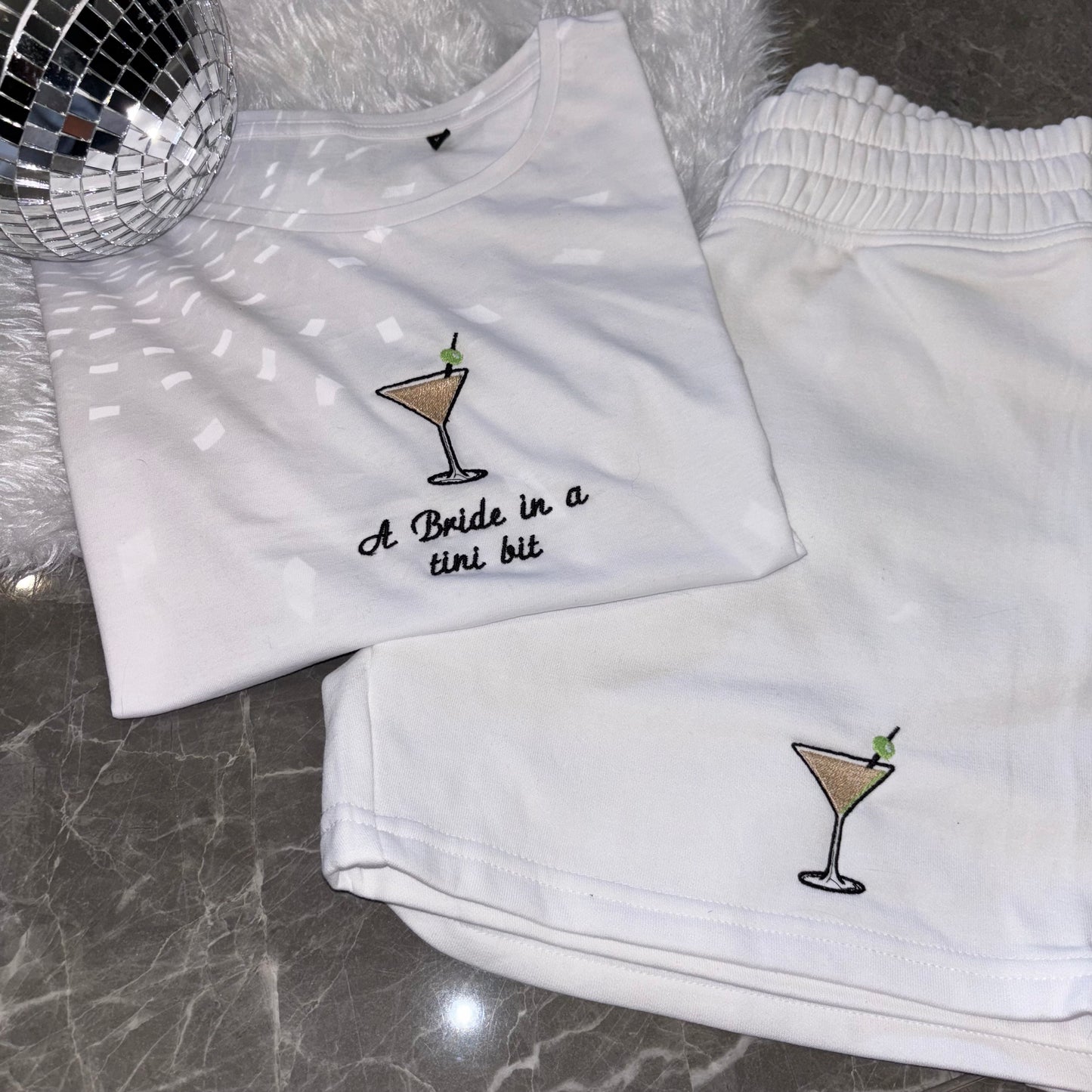 ‘A bride in a tini bit’ dirty martini bride outfit.