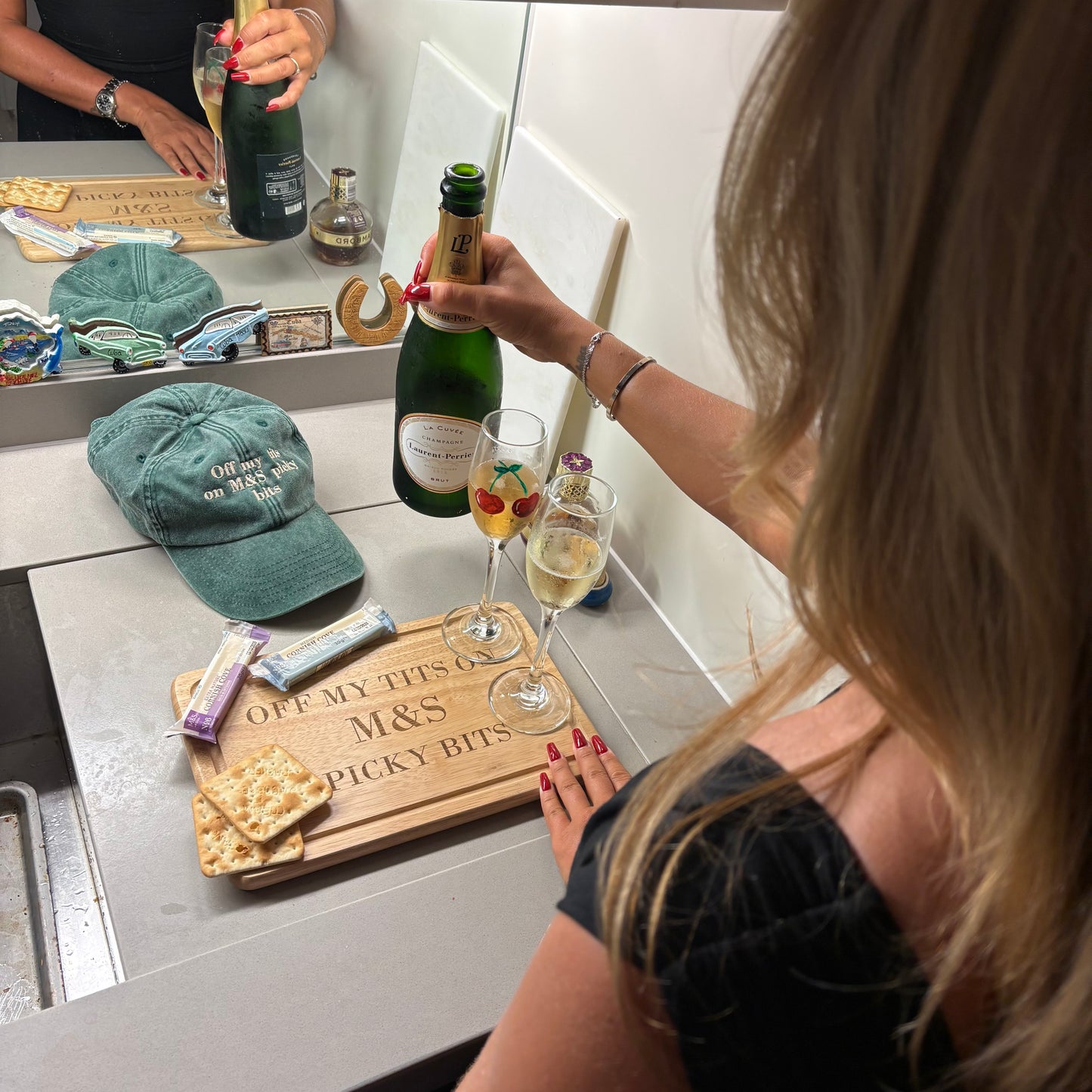 Off my tits on M&S picky bits engraved chopping / cheese board. Viral slogan