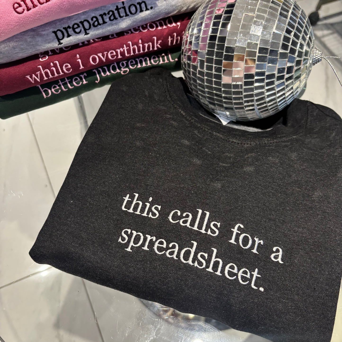 This call for a spreadsheet, embroidered tee / sweater / hoodie.