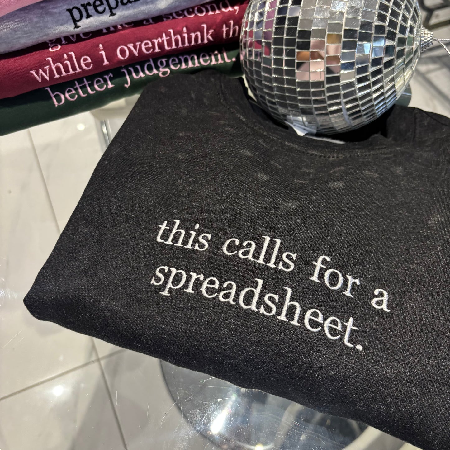 This call for a spreadsheet, embroidered tee / sweater / hoodie.