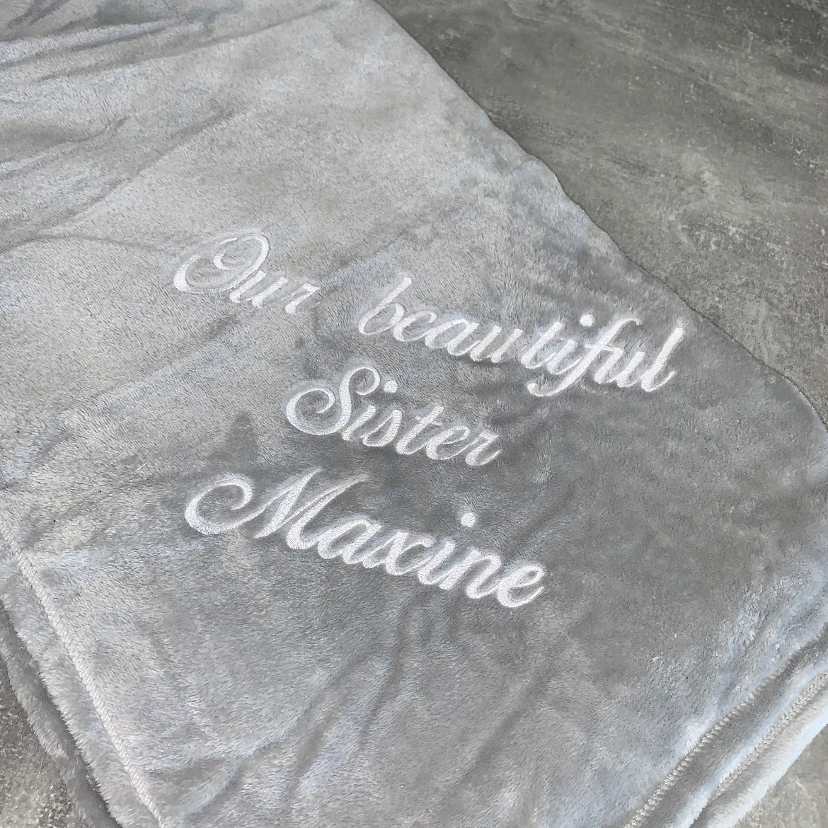 Wrap yourself in personalized luxury with our embroidered blanket