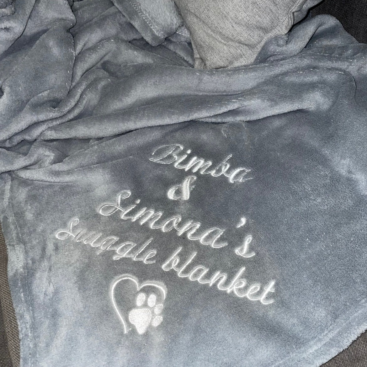 Keep your pet warm and snuggly with a personalized blanket just for them