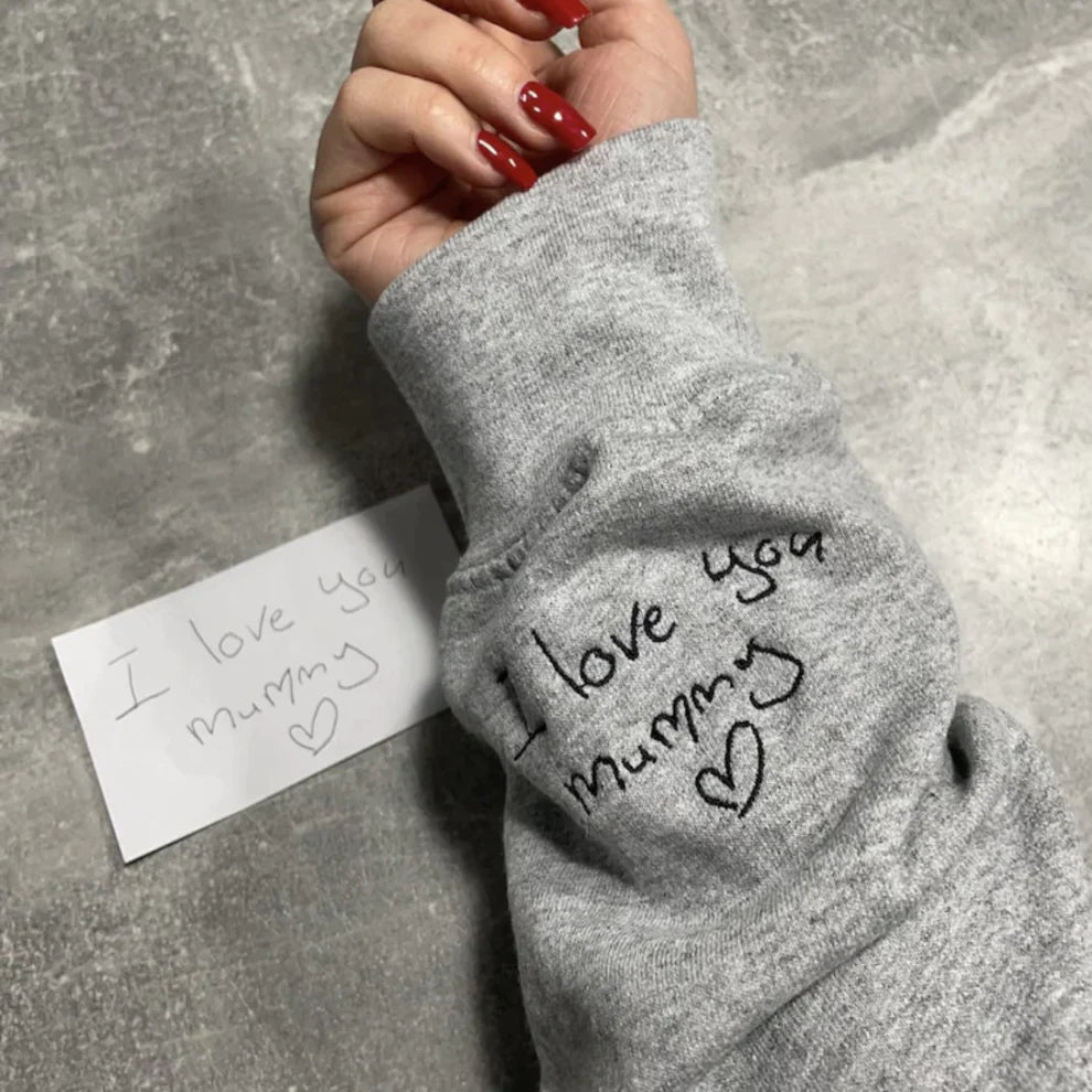 Child’s handwritten note inside sleeve sweatshirt or hoodie for Mother’s / Fathers