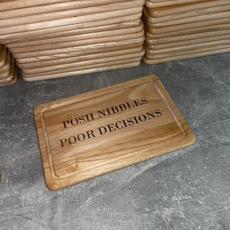 posh nibbles, poor decisions, funny engraved chopping / cheeseboard